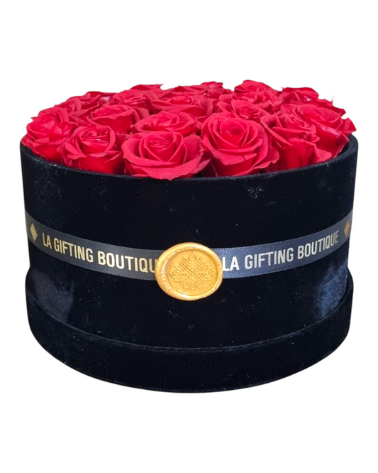 24 Timeless Roses in Black Velvet Round Hat Box.